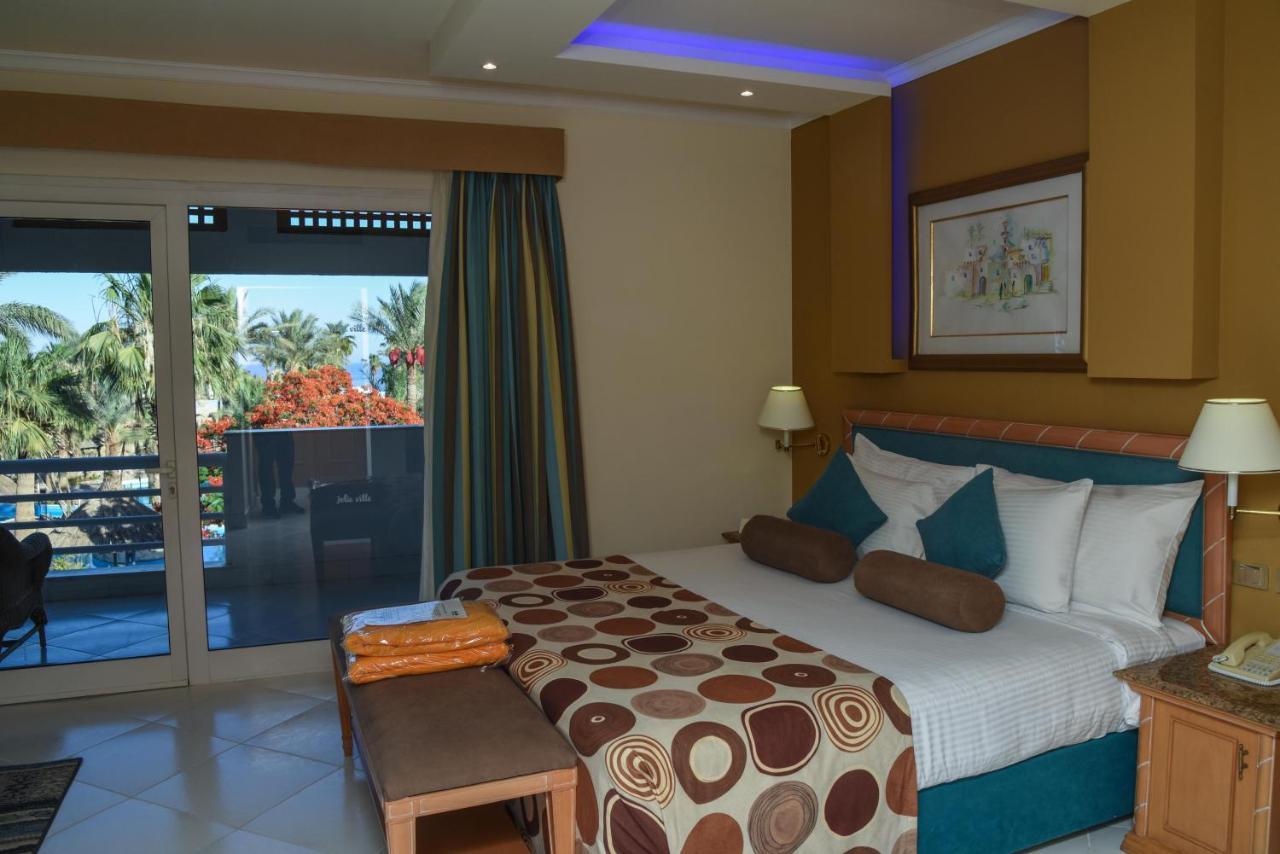 Pickalbatros Golf Beach Resort Sharm el-Sheikh Bagian luar foto A bedroom at the hotel