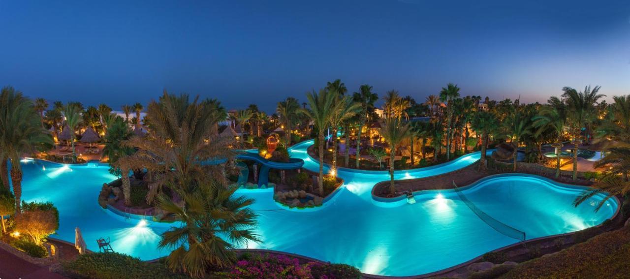 Pickalbatros Golf Beach Resort Sharm el-Sheikh Bagian luar foto The swimming pool at the Hilton Sharm El-Sheikh Resort