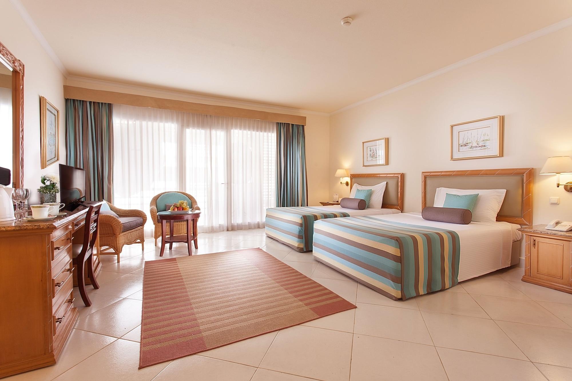 Pickalbatros Golf Beach Resort Sharm el-Sheikh Bagian luar foto A room at the hotel